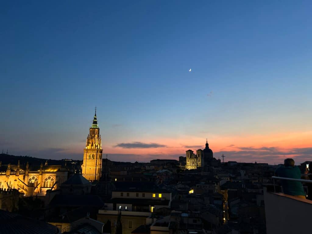 Evening drinks with cathedral views from the Carlos Quinto rooftop in Toledo, Spain